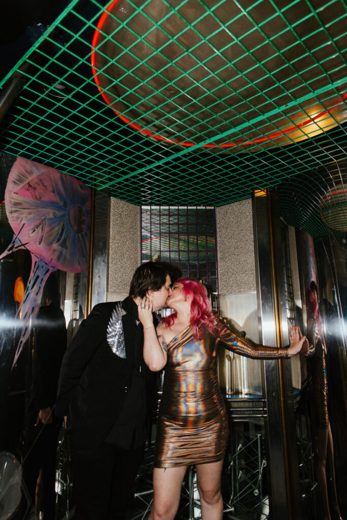 Couple kissing at spaced themed engagement shoot at The Feather Nest Inn New Jersey