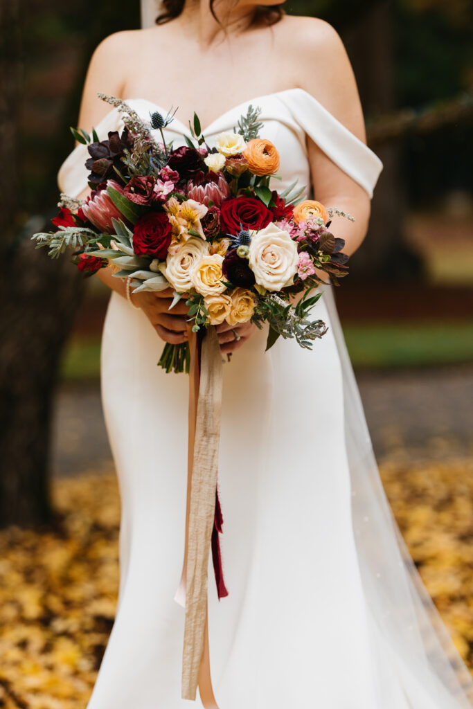 Bride with bouquet at Aldridge Gardens