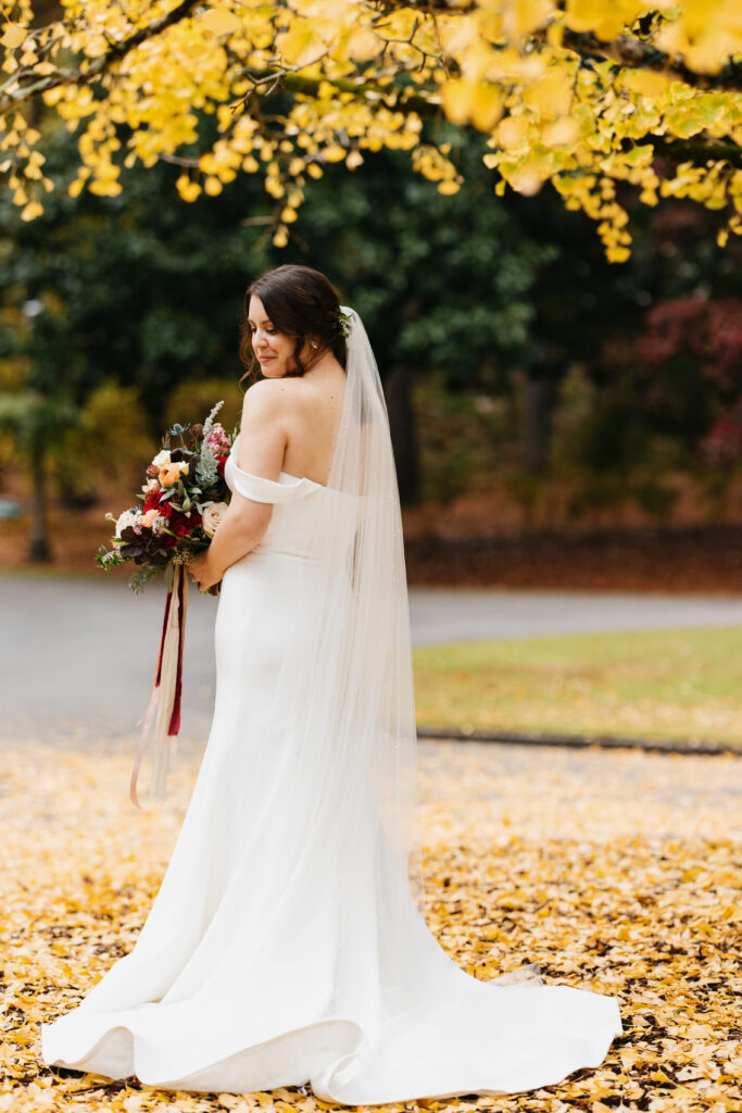 Bride with bouquet at Aldridge Gardens Birmingham