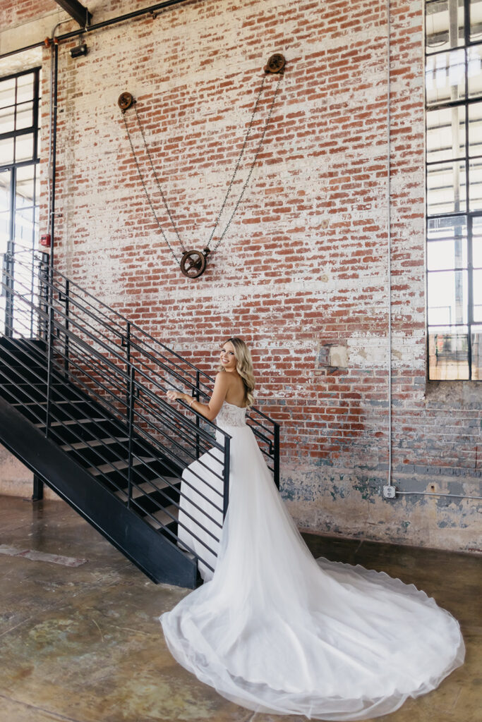 bride walking up staircase for bridal portraits