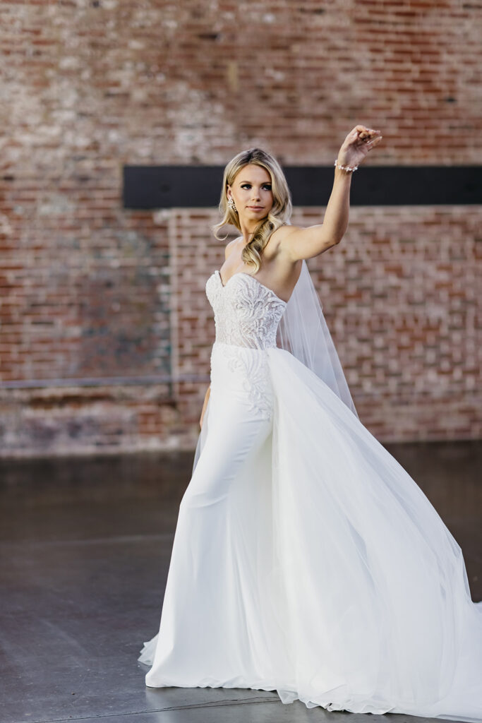 bride twirling dress around