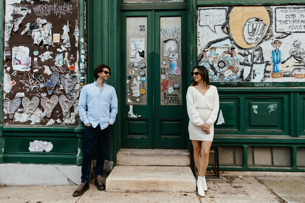 couple standing and posing for philadelphia engagement pictures
