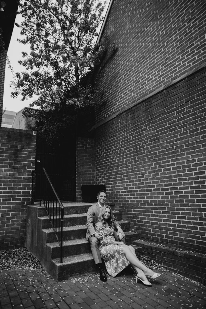 couple posing on steps for philly engagement photos