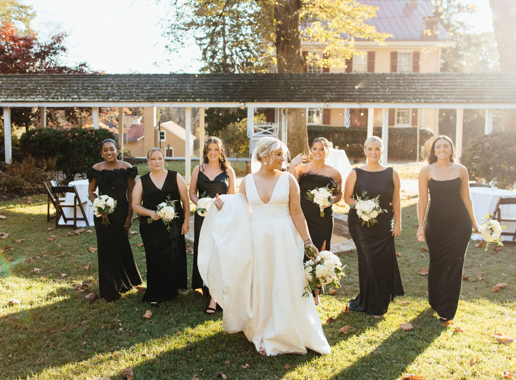 bridesmaids in black dresses for fall wedding