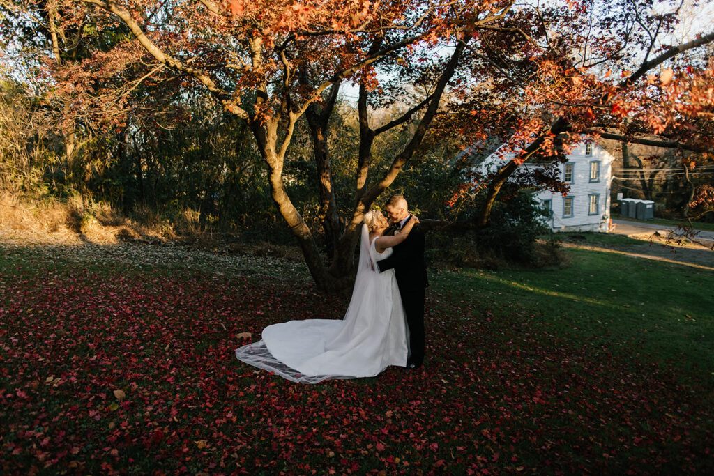 bride and groom golden hour outdoor portraits for fall wedding at The Washington at Historic Yellow Springs